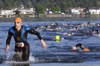 Competitors exit Lake Sammamish during last year's Issaquah Triathlon. More than 1
