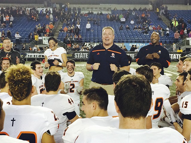 Eastside Catholic celebrates after a victory against the Lakes Lancers in the 2015 Class 3A state semifinals at the Tacoma Dome.