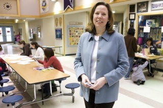 Challenger Elementary School Principal Robin Earl takes a break during kindergarten registration Wednesday