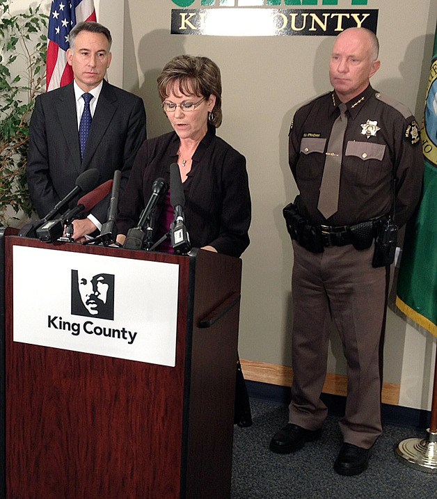 King County counilmember Kathy Lambert speaks about the addition of 14 sheriff deputies as King County Executive Dow Constantine (left) and Sheriff Steve Strachan. Lambert represents residents of Issaquah and Sammamish on the council.