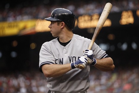 Issaquah graduate and current New York Yankee Colin Curtis bears down Saturday in an at-bat against the Seattle Mariners.
