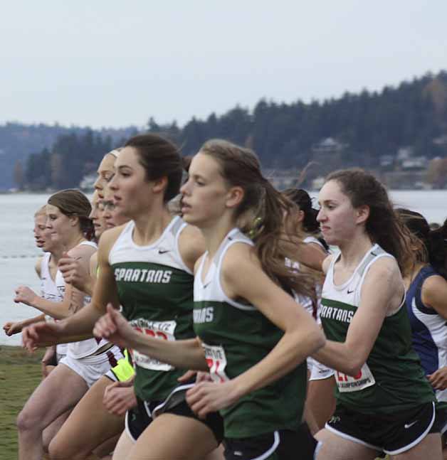 Skyline and Eastlake runners get their start along the beach at Lake Sammamish State Park for the Bi-District Championships.