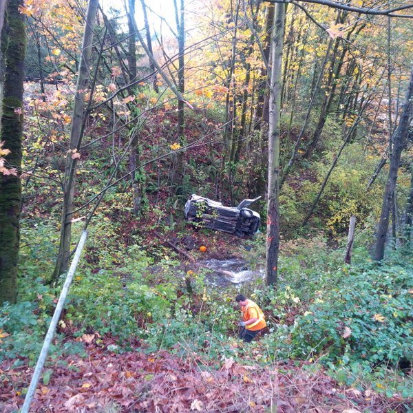 A car containing two 17-year-old girls rolled over and landed in East Fork Issaquah Creek near Sunset Way on Monday.