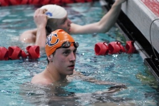 Eastside Catholic's Ethan Hallowell checks his time after the 50-yard freestyle finals Saturday during the Sea-King District championship meet at Mary Wayte Pool on Mercer Isalnd.