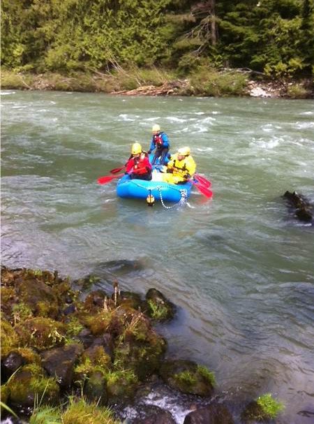 Members of Eatside Fire and Rescue practice their swift water skills by navigating rapids on the Snoqualmie River.
