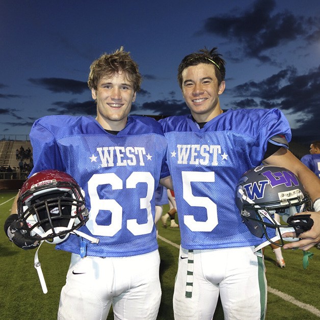 Eastlake grad Brandon Kaufman (left) and Skyline grad Cole Blackburn took the field one last time to represent their prep squads in the All-State game in Moses Lake.