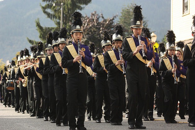 The Issaquah High School band marches in the Salmon Days Grande Parade in 2014.