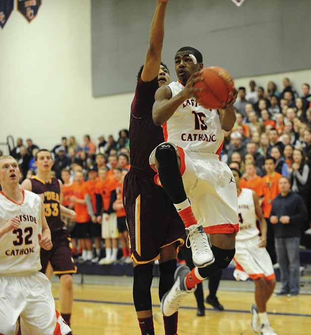 Eastside Catholic's Mandrell Worthy drives to the bucket in a game against O'Dea earlier in the year.