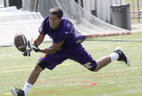 Issaquah's Adam Dondoyano attempts to reel in a pass Saturday at Skyline's 'Skills and Drills on the Hill.'