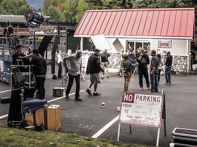 A production crew shoots part of an ad for the Washington State Lottery on Monday in the parking lot of the Issaquah Chamber of Commerce.