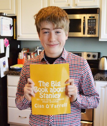 Cian O'Farrell with his self-published book
