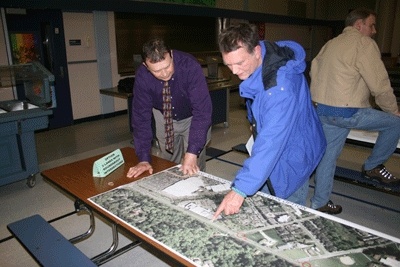 Public Works Deputy Director Sheldon Lynne reviews Newport Way redevelopment plans with the public at a Nov. 12 open house at Issaquah Valley Elementary School.
