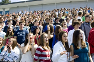 Students shout to show pride in the brand new Eastside Catholic School during a dedication ceremony on Tuesday.