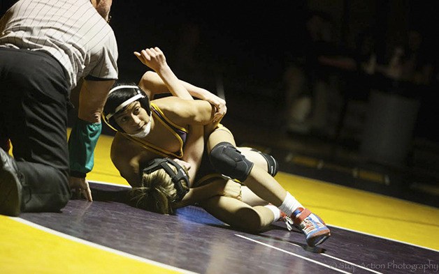 Issaquah Eagles 113-pounder Steven Solusod pinned Bothel grappler Bryce Ames on Jan. 29 at Issaquah High School. The victory cut Bothell's lead to 36-30. Issaquah eventually defeated Bothell 42-36.