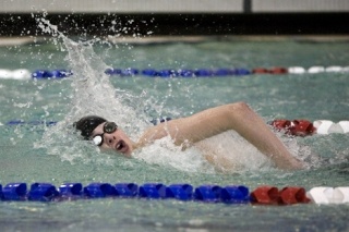 Skyline’s Alex Palumbo swims toward victory in the 200 freestyle on Tuesday.