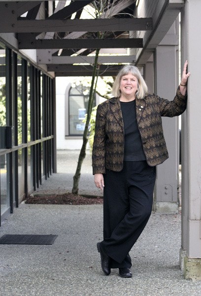 Pam Mauk stands outside the Together Center in Redmond