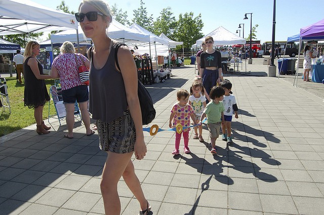 Little ones take a stroll through the Sammamish Farmers Market opening day May 11.