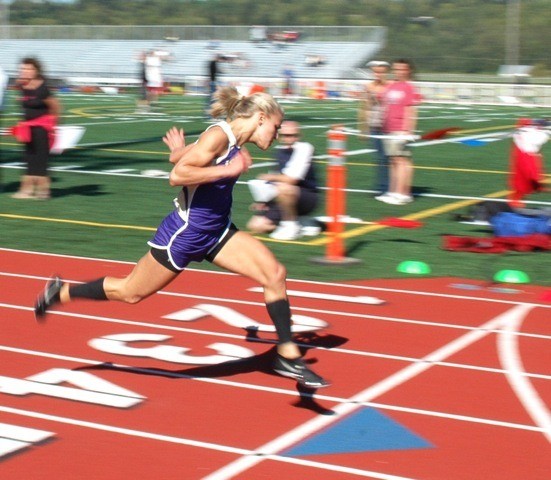 Issaquah's Haley Jacobson cruises to a first-place finish in the 100 meter dash during the District 1/2 prelims at Marysville-Pilchuck. She went on to win titles in the 100 and 200 and helped the 400 and 800 relays to championships.