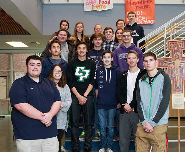 Twenty-two Eastside Catholic students qualify for DECA State Championship in March 3-5.
