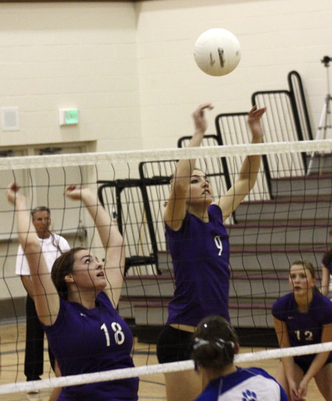 Issaquah's Stephanie Stoll goes up for a block Monday against Bothell