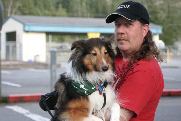 Mike Waine and his sheltie Sammy were attacked by an off-leash dog in the Evans Lane neighborhood. Off-leash dogs have been a growing problem in the neighborhood