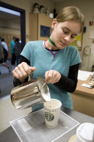 Amy Wiesinger pours steamed milk for a latte. Steamed Lightning Espresso is open to teachers every Friday morning.