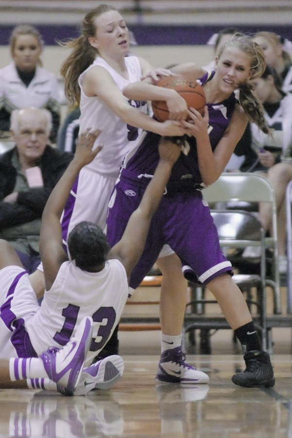 Issaquah guard Tayrn Holmes returns as the Eagles'  senior captain in 2012.