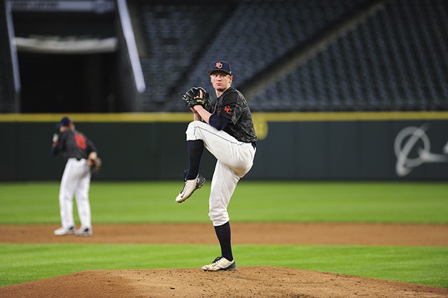 Eastside Catholic Crusaders pitcher Jackson Bandow uncorks a pitch toward the plate during warmups at a game at Safeco Field in Seattle during the 2016 baseball season.