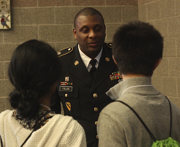 A U.S. Army recruiter speaks with students at the March 5 Great Careers Conference.