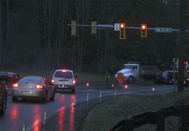 The semitruck that had blocked Sahalee Way Northeast in the afternoon Thursday is being towed away. City crews reroute traffic while the roadway was blocked.