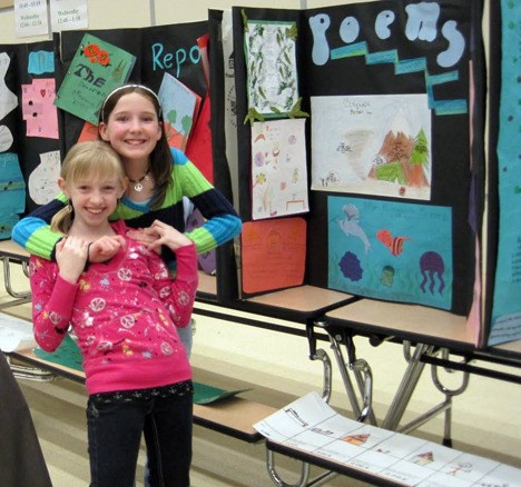 Sammamish Arbor School upper elementary students Maddi Manelski and Presley Knox were very proud of their classmates’ display at the school’s Annual Cultural Night held the last weekend in January.