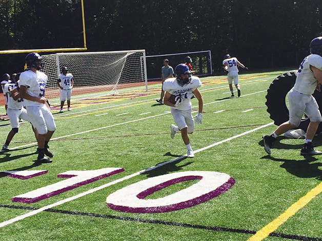 Eagles’ running back Kyle Densley sprints down the field during drills on June 16 in Issaquah. The Eagles will be led by starting quarterback Cameron Humphrey this fall.