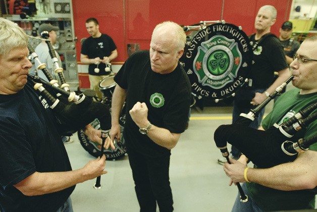 Eastside Fire and Rescue firefighters practice in their pipes and drums group.