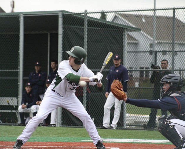 Skyline's Matt Sinatro looks at a pitch during the team's opening season game against Eastside Catholic.