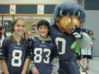 Sunset Elementary fifth-graders Caroline Mull and Dane Mui are surprised by Blitz