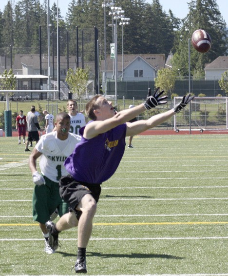 Issaquah's Evan Peterson reaches out for a pass during the second annual Skills and Drills on the Hill