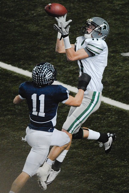Skyline WR Mason Gregory makes a leaping catch for a second quarter touchdown against Skyview in the WIAA 4A state championship game at the Tacoma Dome on Saturday.