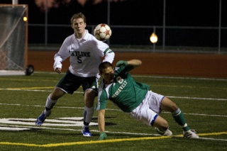 Skyline’s Josh Twaddle battles with Roosevelt’s Stephen U on Tuesday night at Spartan Stadium. The two teams had several scoring opportunities