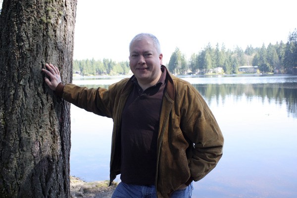 Local poet Michael Dylan Welch stands in front of Beaver Lake