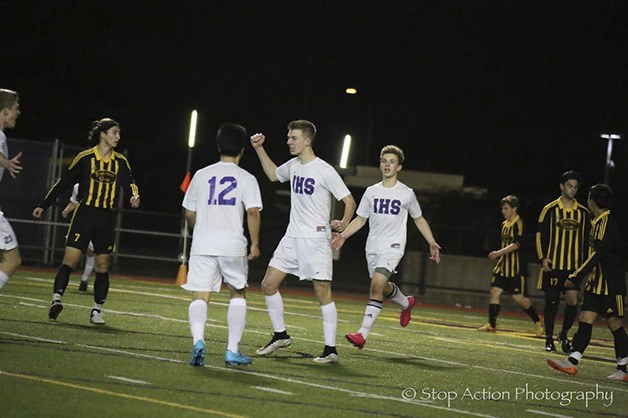 Issaquah junior Jack MacDonald celebrates after scoring a goal in the 23rd minute