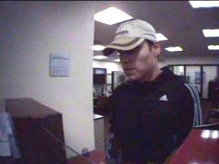 Police are asking the public for help in identifying this man in an Issaquah bank robbery case.