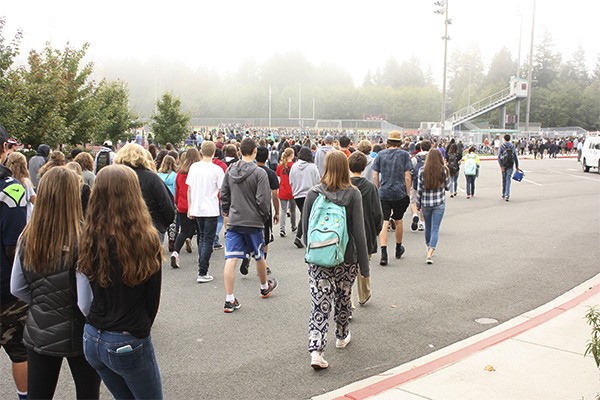 Eastlake High School students walk out to the campus sports field during the 2015 Great Washington ShakeOut Earthquake drill Oct. 15 shortly after 10:15 a.m.