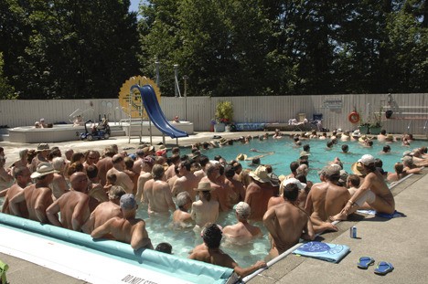 Fraternity Snoqualmie members stripped down to their birthday suits and hit the pool in an attempt to break the world record they set last year for the most people in a skinny dip.