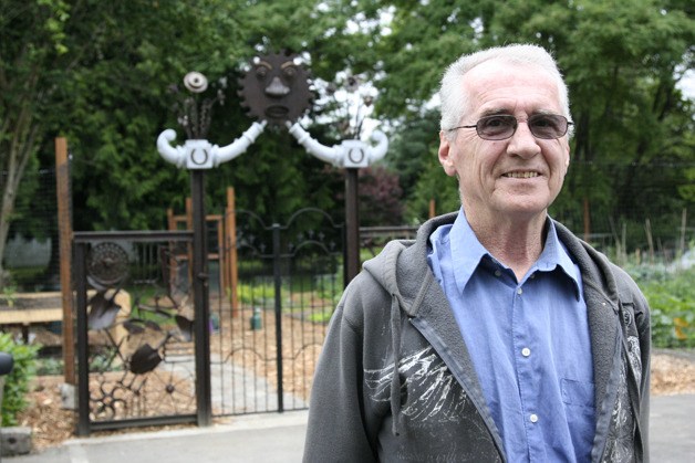 Denny Croston built a garden gate for the Issaquah Flatland community garden by using junk he’s picked up over the years. He was selected among a number of applicants for the Issaquah Arts Commission grant.