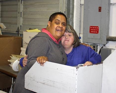 Joanne Jacob and Kelley Cooper shred documents at the AtWork! Recycling Center.