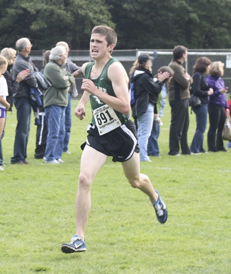 Skyline's Kyle Branch pushes towards the finish line last Thursday at Seattle's Lincoln Park. The senior won the KingCo 4A title in a time of 15 minutes