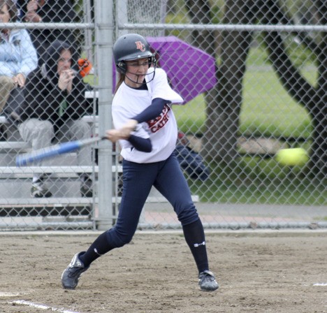 Eastside Catholic freshman Courtney Brown gets ready to drive a three-run double into the gap Monday afternoon against Nathan Hale.