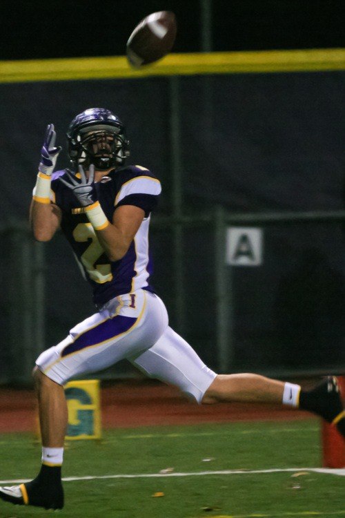Issaquah junior Jake Bakamus hauls in a 24-yard touchdown pass from Braden Bouwman. The score opened the floodgates for the Eagles