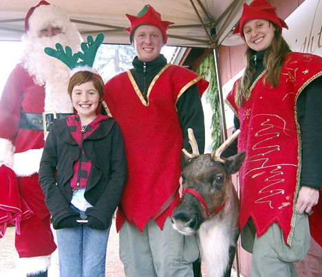 Santa Claus brought his helpers Logan Hendricks and Sasha Puskar