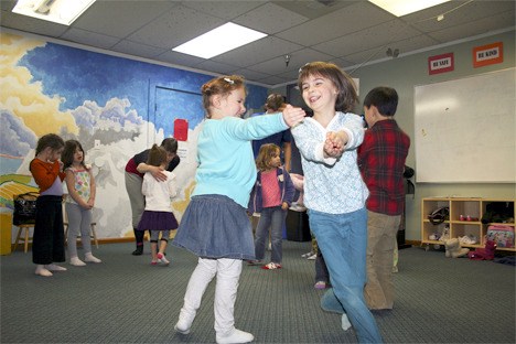 Isabella Adney and Sophie DeRie enjoy their class at Studio East in Kirkland.